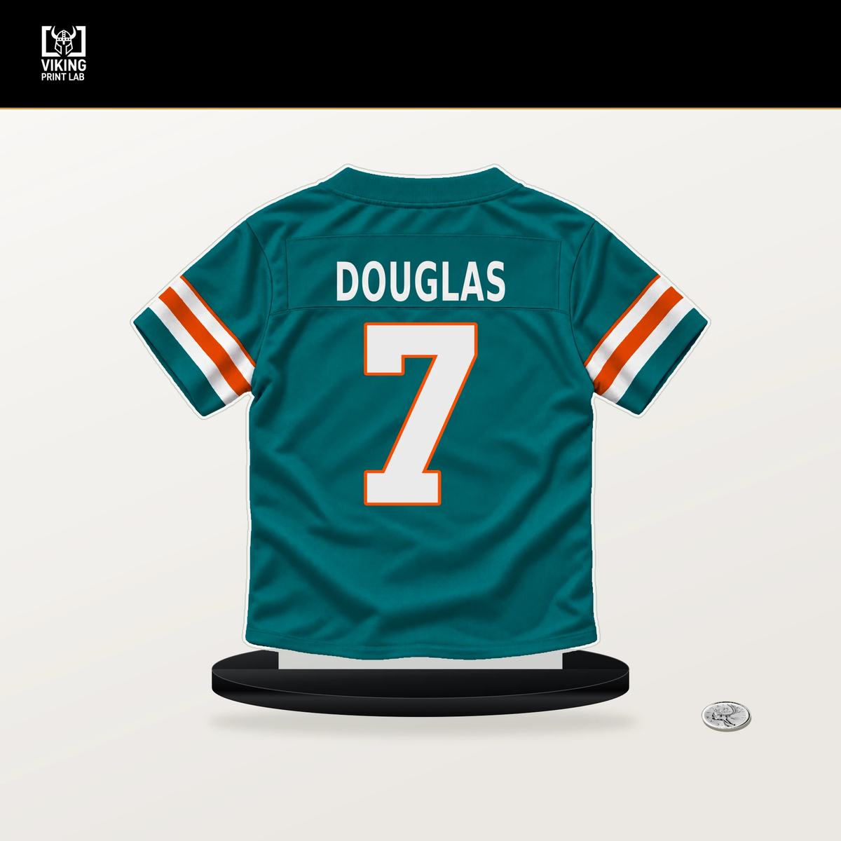 Caleb Douglas number 7 Miami Dolphins jersey stand with included black base.