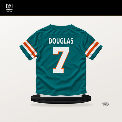 Caleb Douglas number 7 Miami Dolphins jersey stand with included black base.