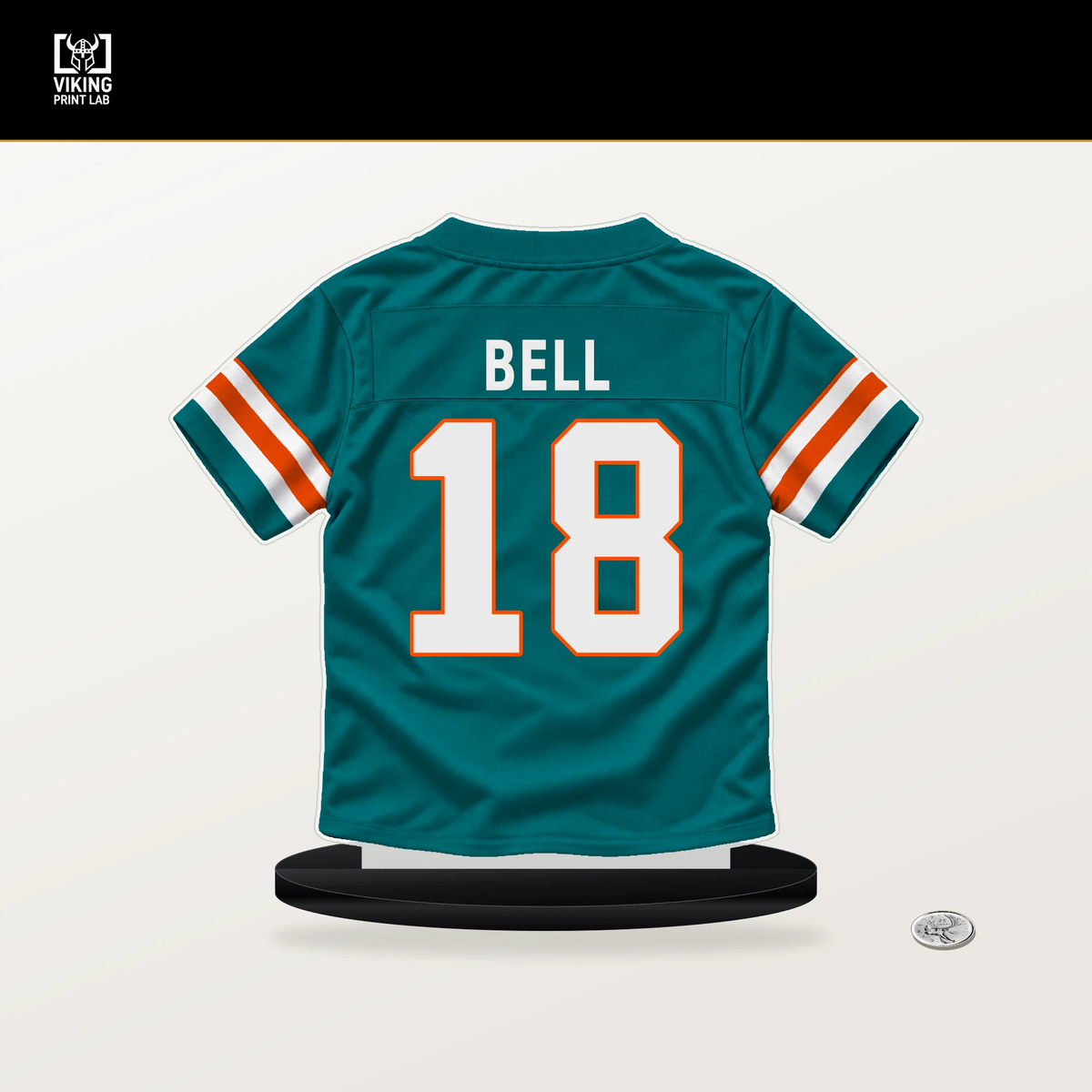 Chris Bell number 18 Miami Dolphins jersey stand with included black base.