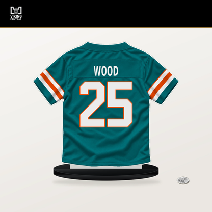 Julius Wood number 25 Miami Dolphins jersey stand with included black base.