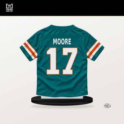 Trey Moore number 17 Miami Dolphins jersey stand with included black base.