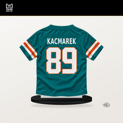 Will Kacmarek number 89 Miami Dolphins jersey stand with included black base.