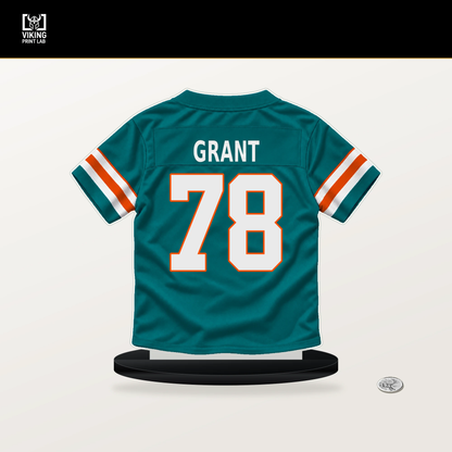 Kenneth Grant number 78 Miami Dolphins jersey stand with included black base.
