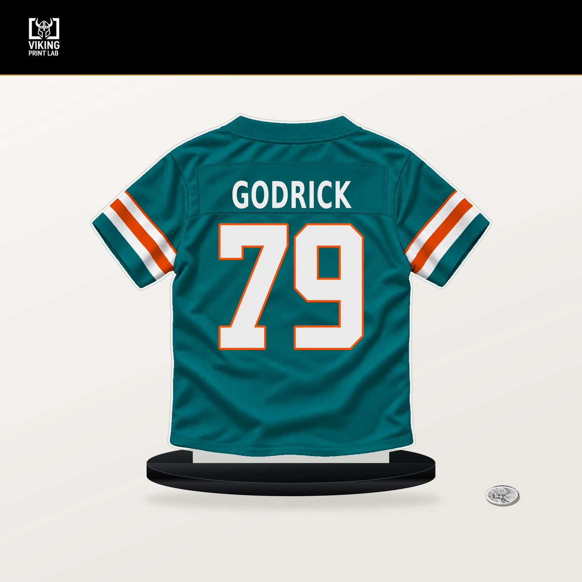 Chukwuebuka Godrick number 79 Miami Dolphins jersey stand with included black base.