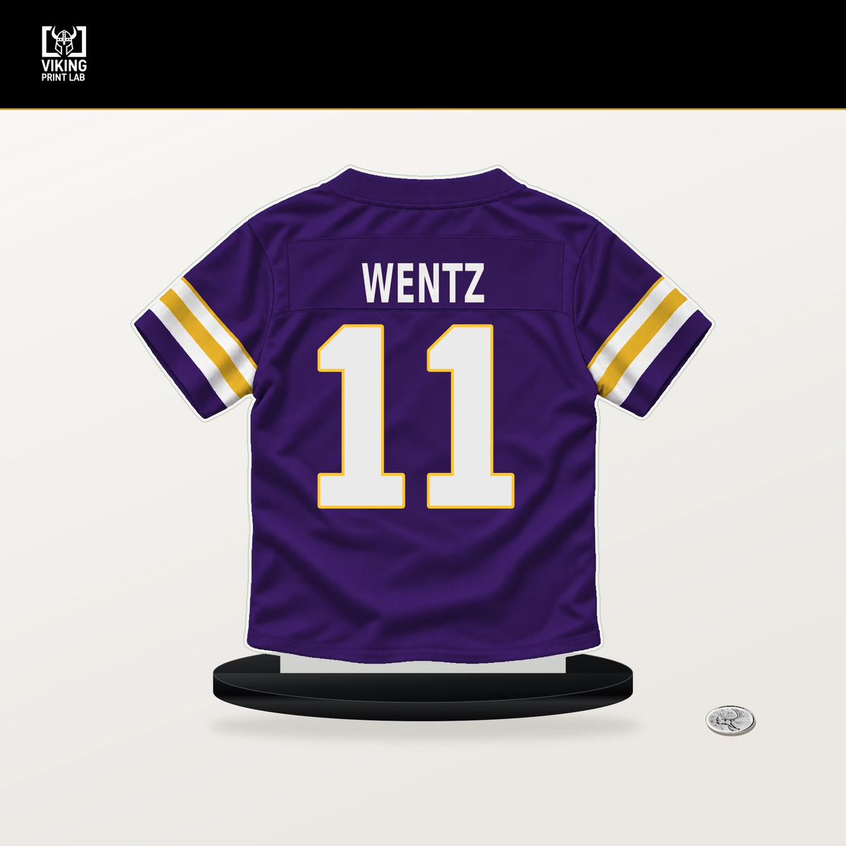 Carson Wentz number 11 Minnesota Vikings jersey stand with included black base.