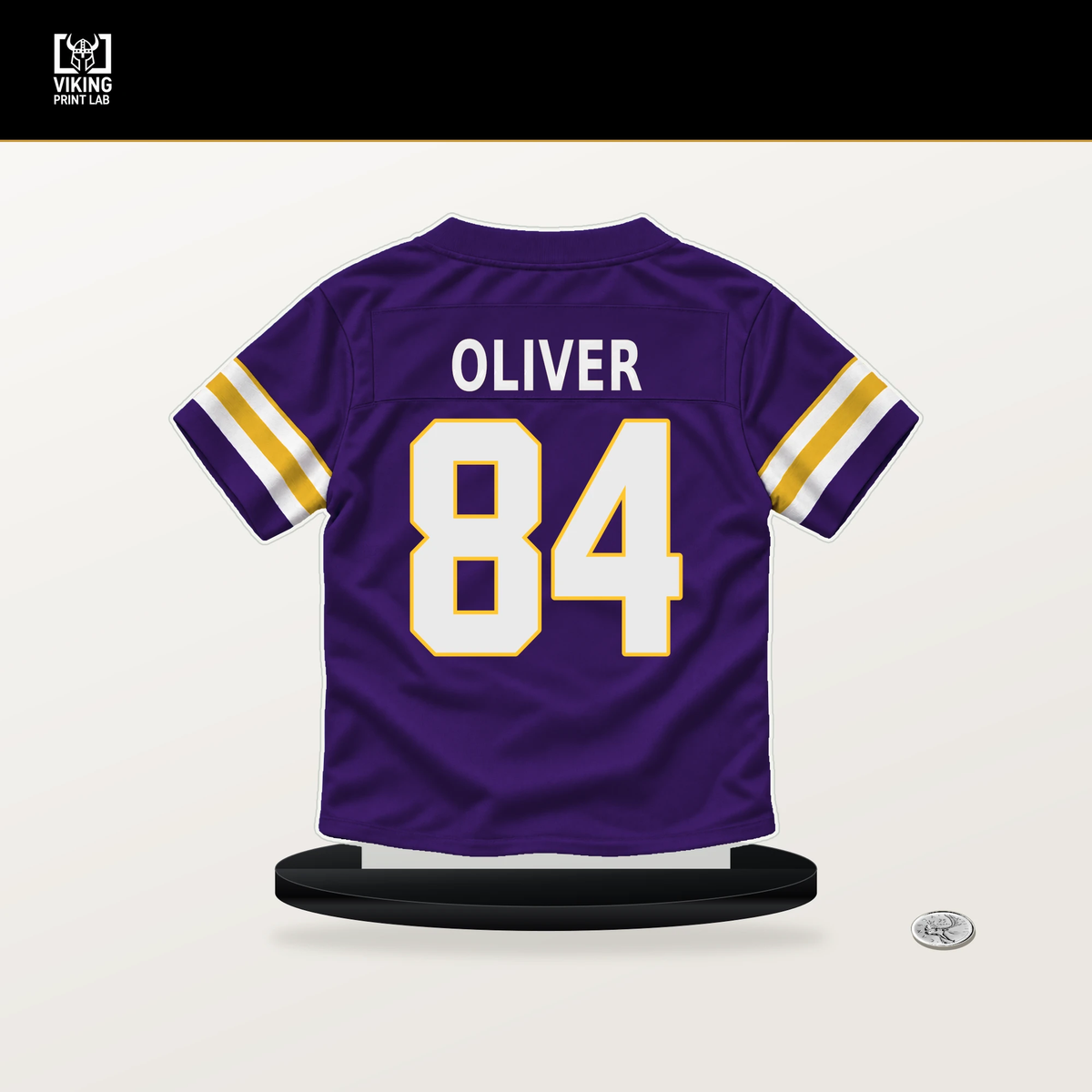 Josh Oliver number 84 Minnesota Vikings jersey stand with included black base.