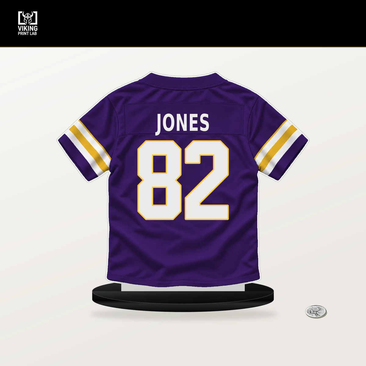 Jeshaun Jones number 82 Minnesota Vikings jersey stand with included black base.