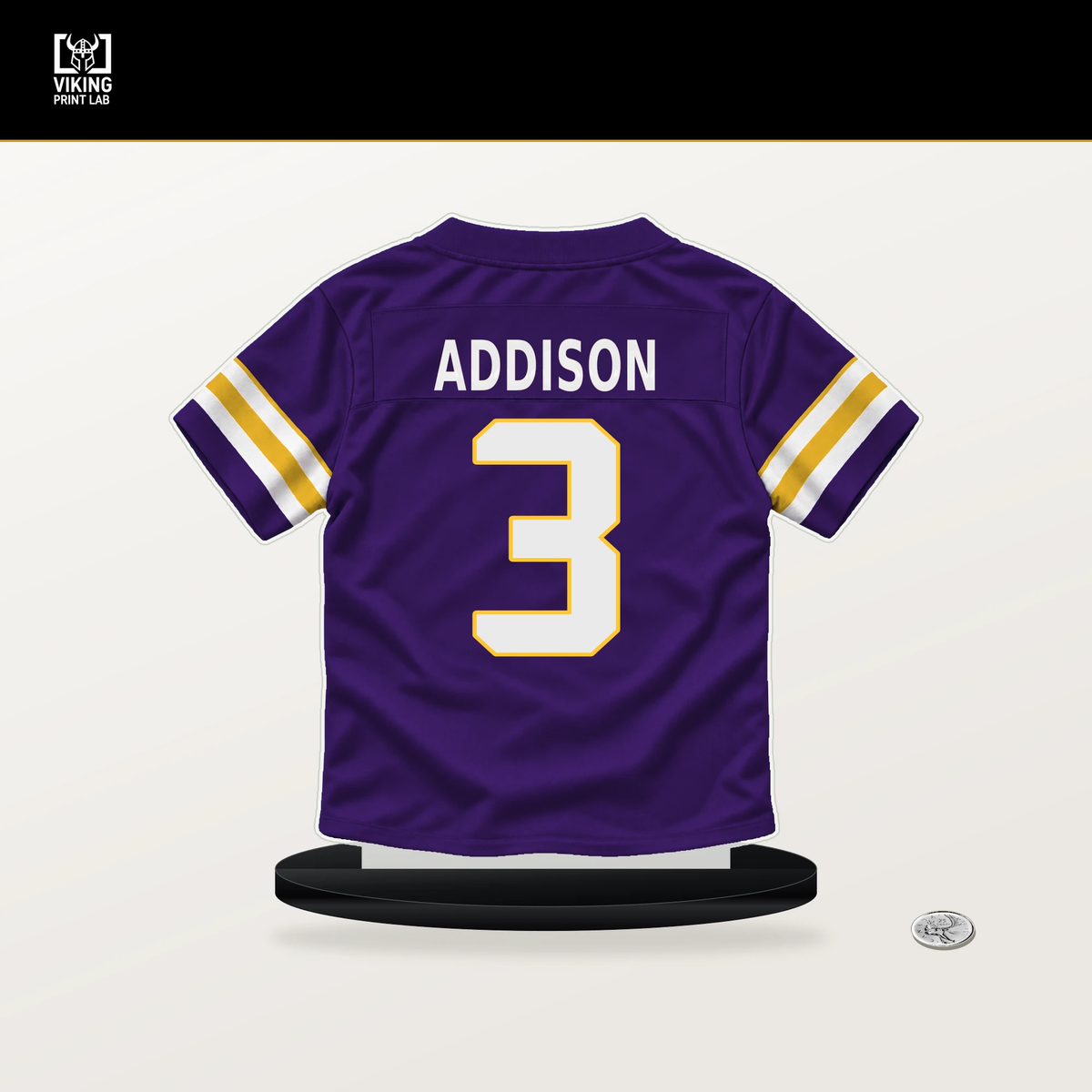 Jordan Addison number 3 Minnesota Vikings jersey stand with included black base.