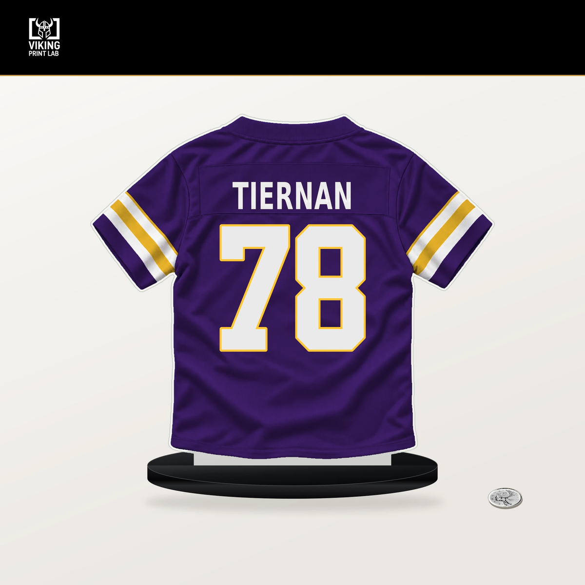 Caleb Tiernan number 78 Minnesota Vikings jersey stand with included black base.
