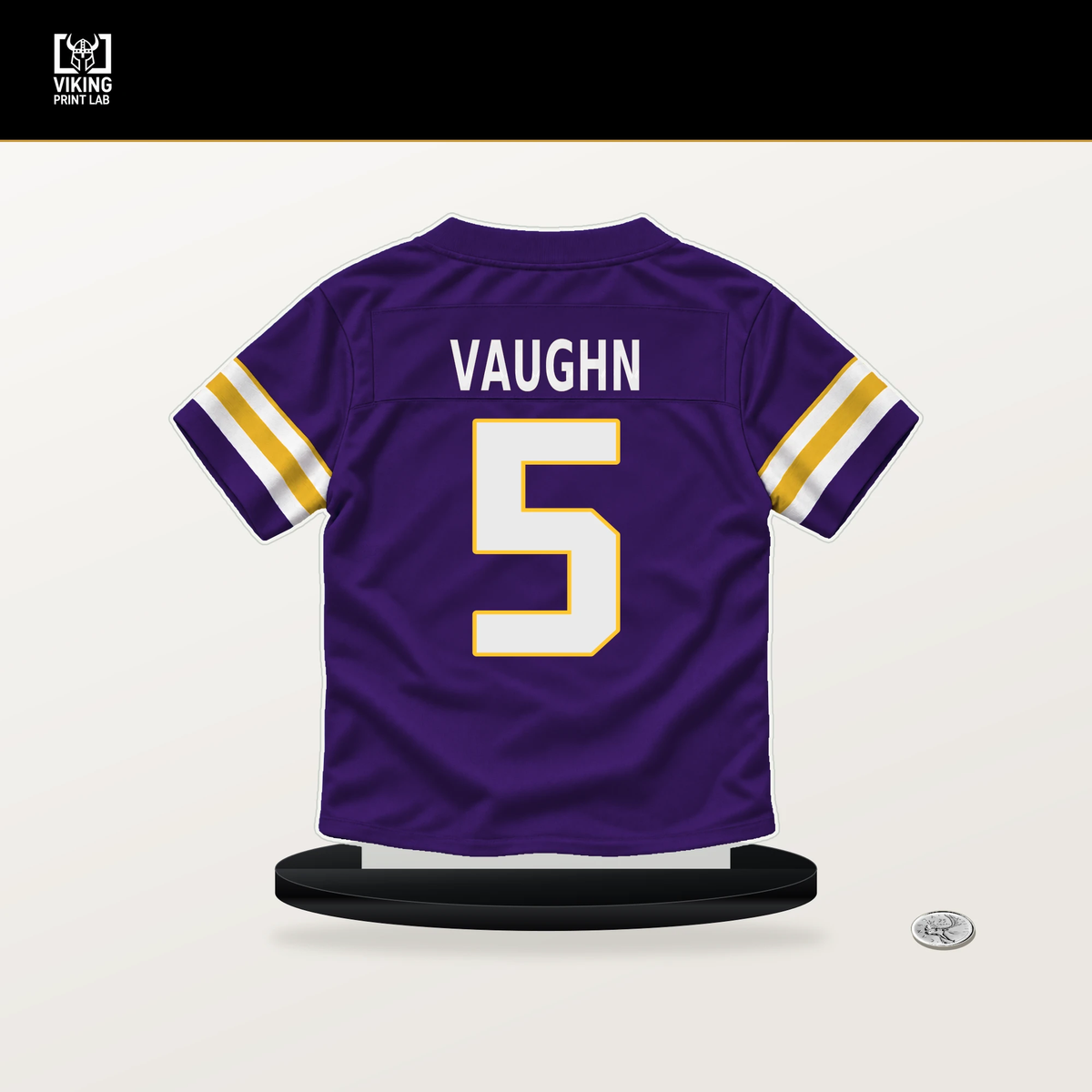 Zemaiah Vaughn number 5 Minnesota Vikings jersey stand with included black base.