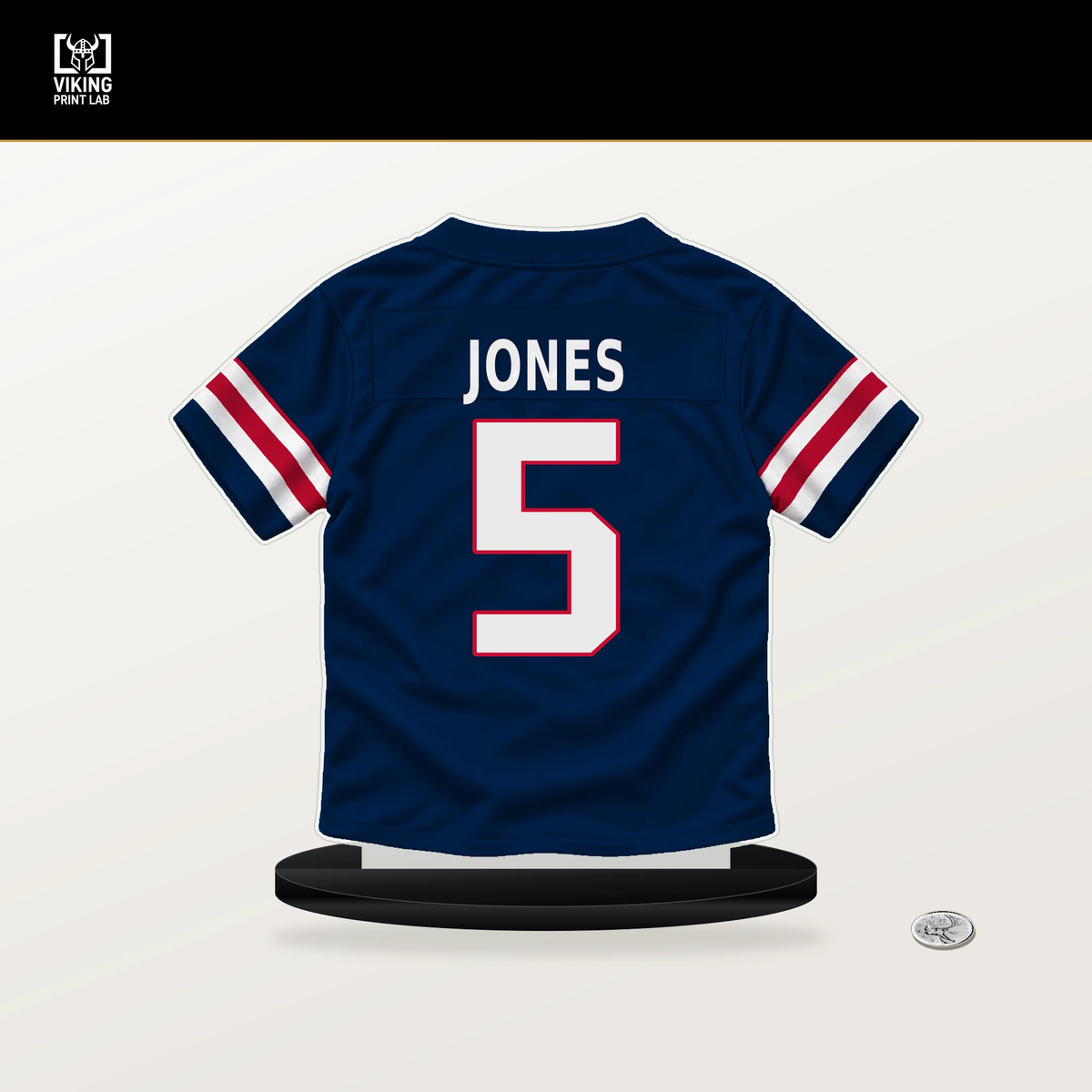 Dre'Mont Jones number 5 New England Patriots jersey stand with included black base.