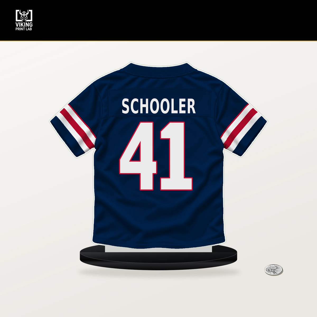 Brenden Schooler number 41 New England Patriots jersey stand with included black base.