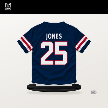 Marcus Jones number 25 New England Patriots jersey stand with included black base.