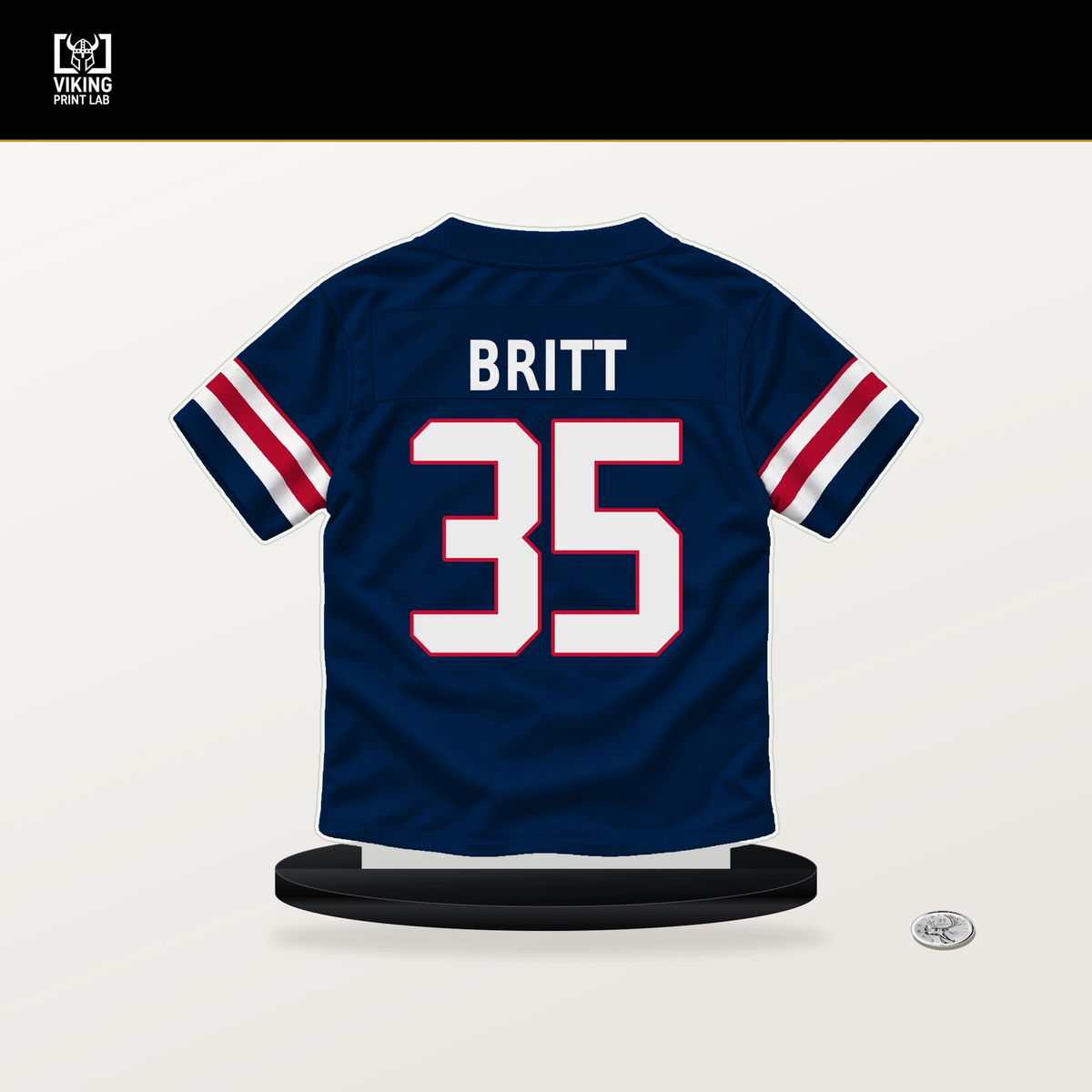 K.J. Britt number 35 New England Patriots jersey stand with included black base.