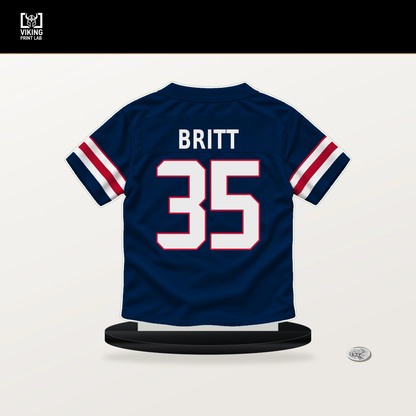 K.J. Britt number 35 New England Patriots jersey stand with included black base.