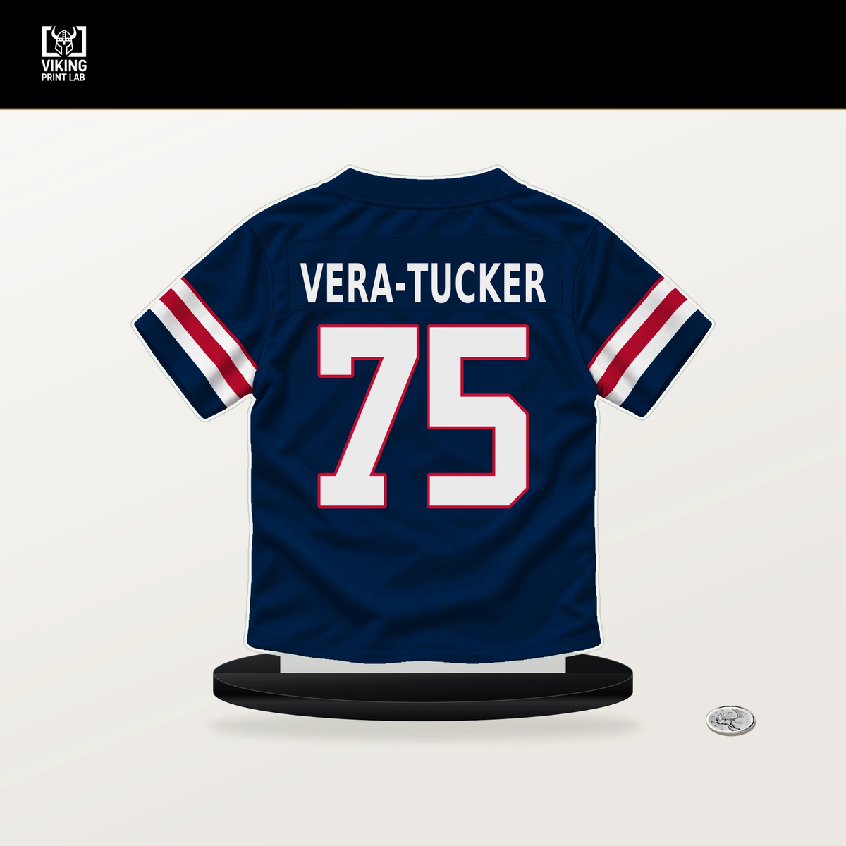 Alijah Vera-Tucker number 75 New England Patriots jersey stand with included black base.