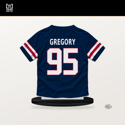 Eric Gregory number 95 New England Patriots jersey stand with included black base.