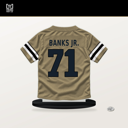 Kelvin Banks Jr. number 71 New Orleans Saints jersey stand with included black base.