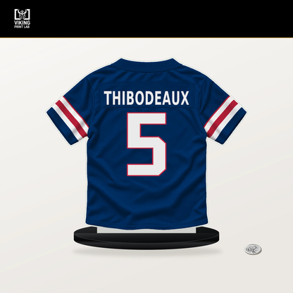 Kayvon Thibodeaux number 5 New York Giants jersey stand with included black base.