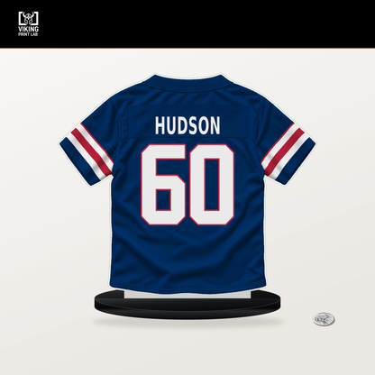 Bryan Hudson number 60 New York Giants jersey stand with included black base.