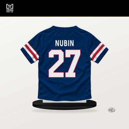 Tyler Nubin number 27 New York Giants jersey stand with included black base.