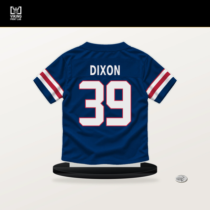 Thaddeus Dixon number 39 New York Giants jersey stand with included black base.