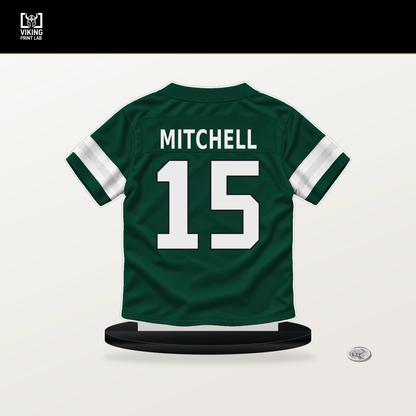 Adonai Mitchell number 15 New York Jets jersey stand with included black base.