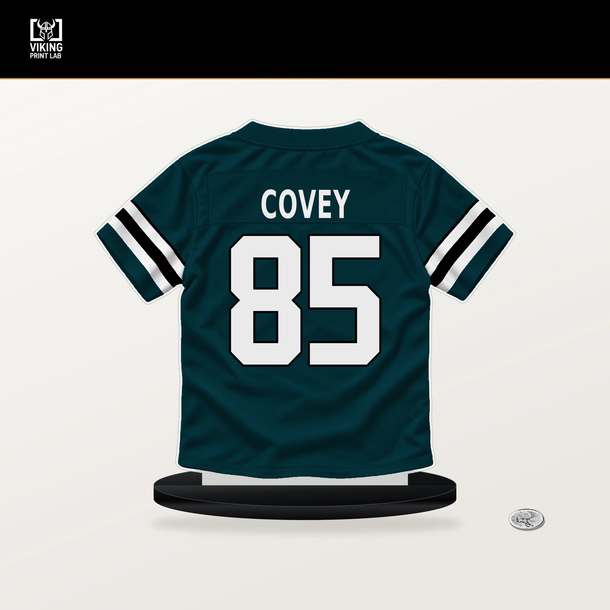 Britain Covey number 85 Philadelphia Eagles jersey stand with included black base.