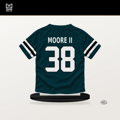 Kenny Moore II number 38 Philadelphia Eagles jersey stand with included black base.