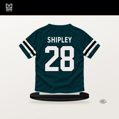 Will Shipley number 28 Philadelphia Eagles jersey stand with included black base.