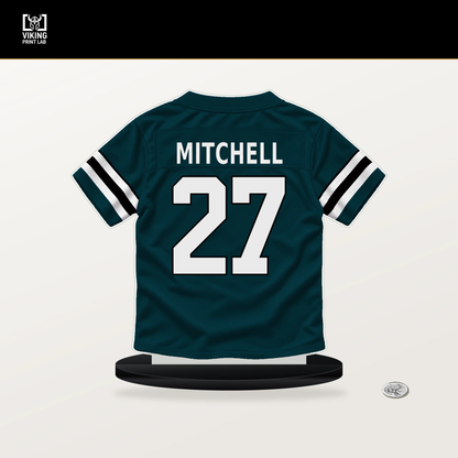 Quinyon Mitchell number 27 Philadelphia Eagles jersey stand with included black base.