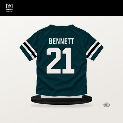 Jakorian Bennett number 21 Philadelphia Eagles jersey stand with included black base.