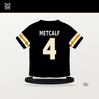 DK Metcalf number 4 Pittsburgh Steelers jersey stand with included black base.