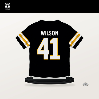Payton Wilson number 41 Pittsburgh Steelers jersey stand with included black base.