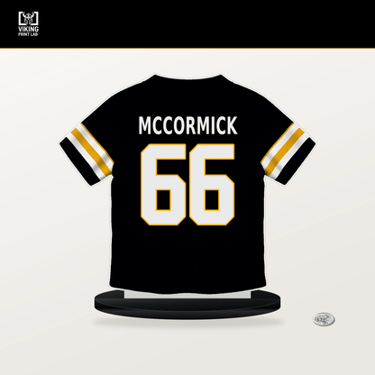 Mason McCormick number 66 Pittsburgh Steelers jersey stand with included black base.