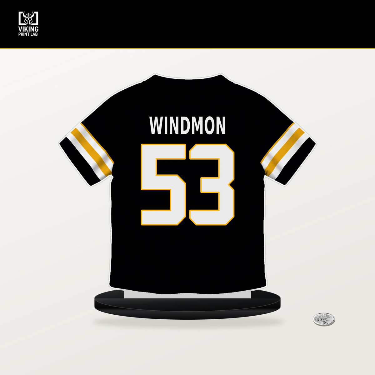 Jacoby Windmon number 53 Pittsburgh Steelers jersey stand with included black base.