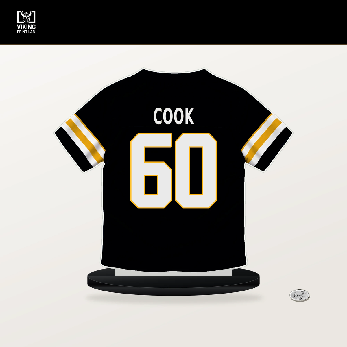 Dylan Cook number 60 Pittsburgh Steelers jersey stand with included black base.