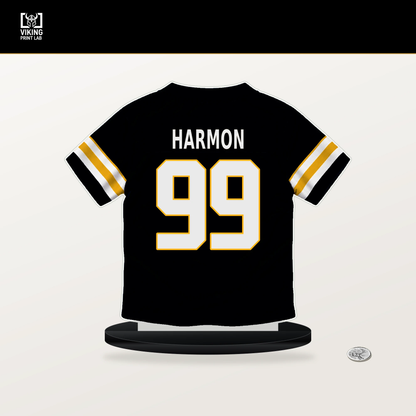 Derrick Harmon number 99 Pittsburgh Steelers jersey stand with included black base.