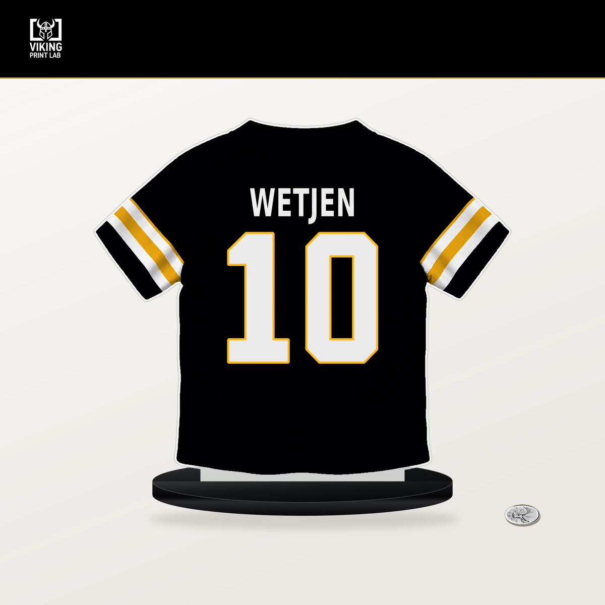 Kaden Wetjen number 10 Pittsburgh Steelers jersey stand with included black base.