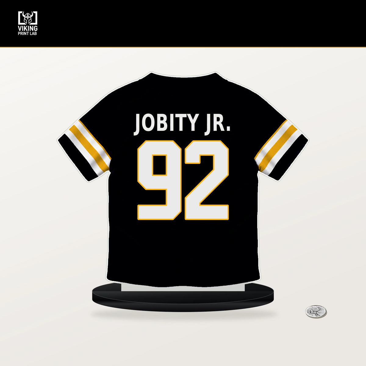 Kevin Jobity Jr. number 92 Pittsburgh Steelers jersey stand with included black base.