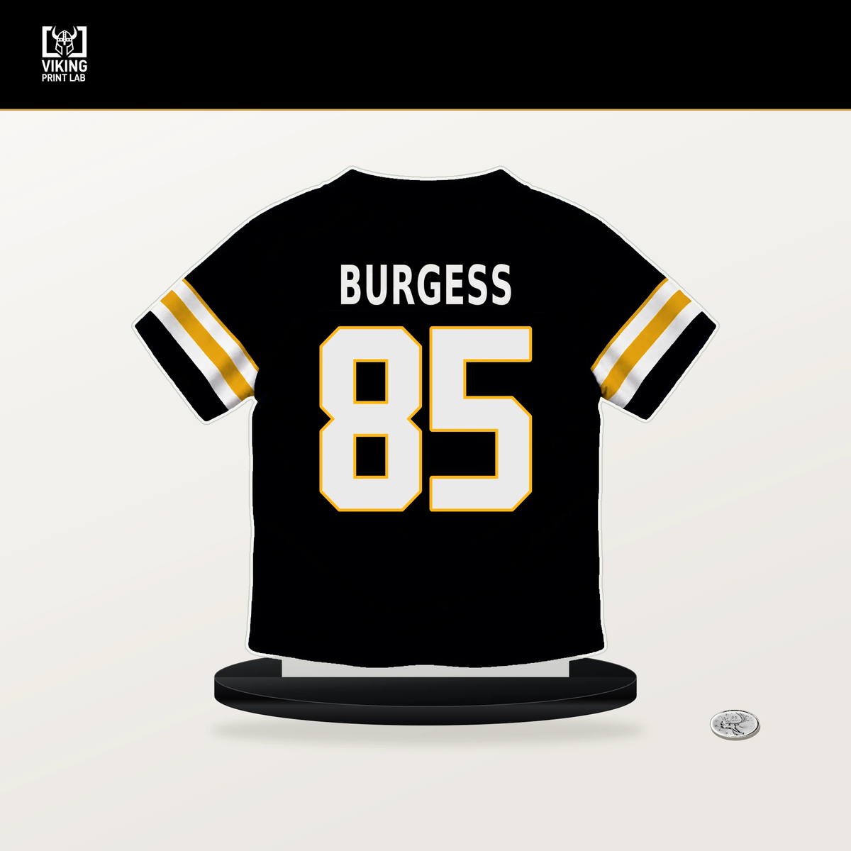 Cole Burgess number 85 Pittsburgh Steelers jersey stand with included black base.