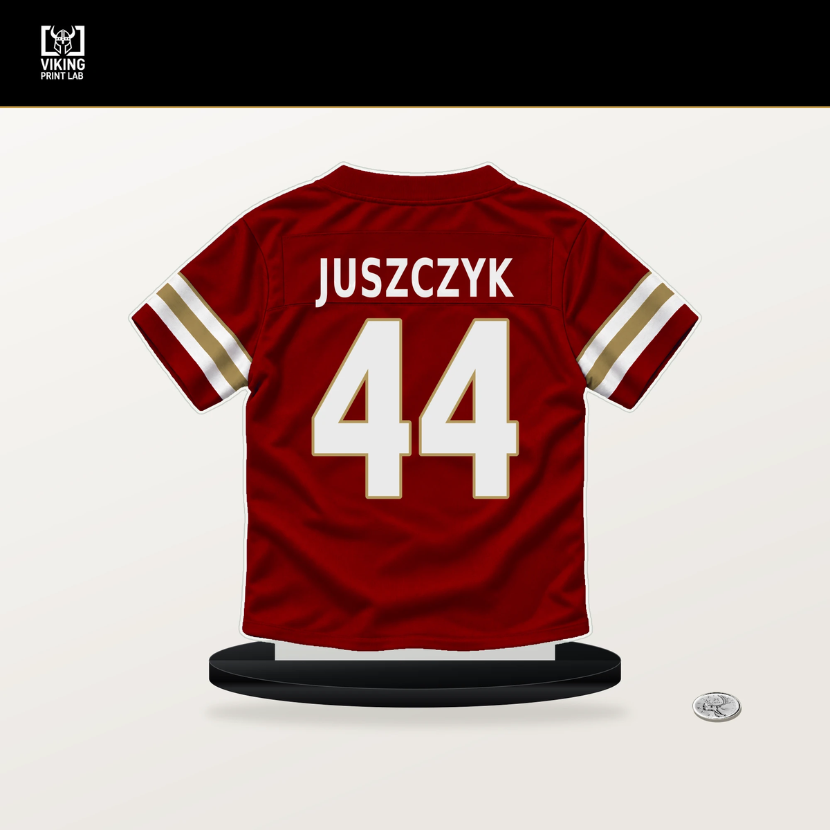 Kyle Juszczyk number 44 San Francisco 49ers jersey stand with included black base.