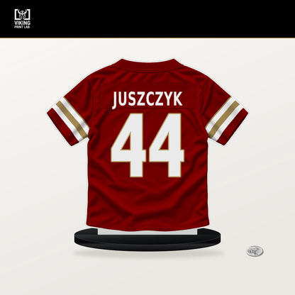 Kyle Juszczyk number 44 San Francisco 49ers jersey stand with included black base.
