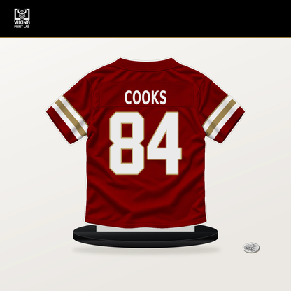 Brandin Cooks number 84 San Francisco 49ers jersey stand with included black base.