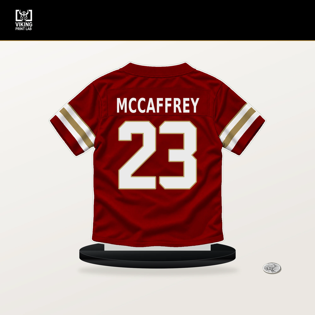 Christian McCaffrey number 23 San Francisco 49ers jersey stand with included black base.