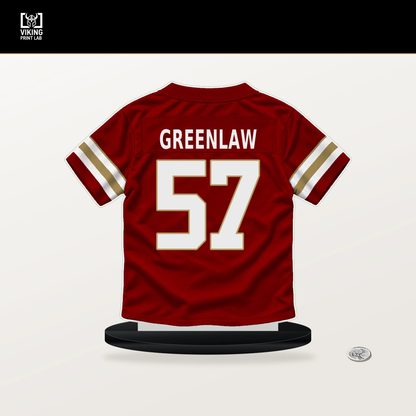 Dre Greenlaw number 57 San Francisco 49ers jersey stand with included black base.