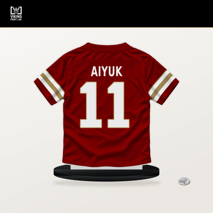 Brandon Aiyuk number 11 San Francisco 49ers jersey stand with included black base.