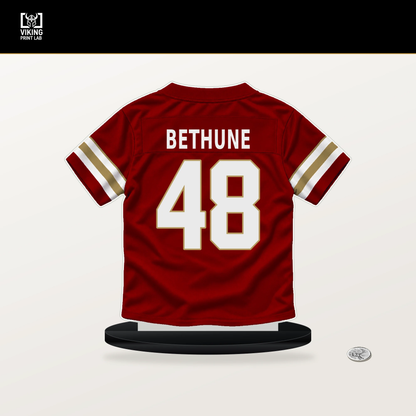 Tatum Bethune number 48 San Francisco 49ers jersey stand with included black base.