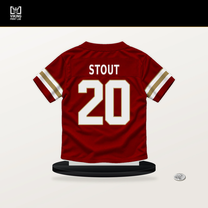 Upton Stout number 20 San Francisco 49ers jersey stand with included black base.