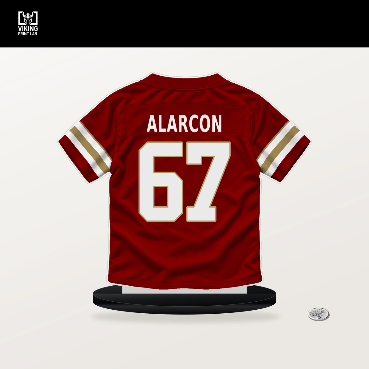 Isaac Alarcon number 67 San Francisco 49ers jersey stand with included black base.